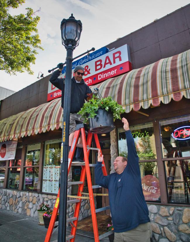 Flower baskets are up in the West Seattle Junction; Colorful displays
